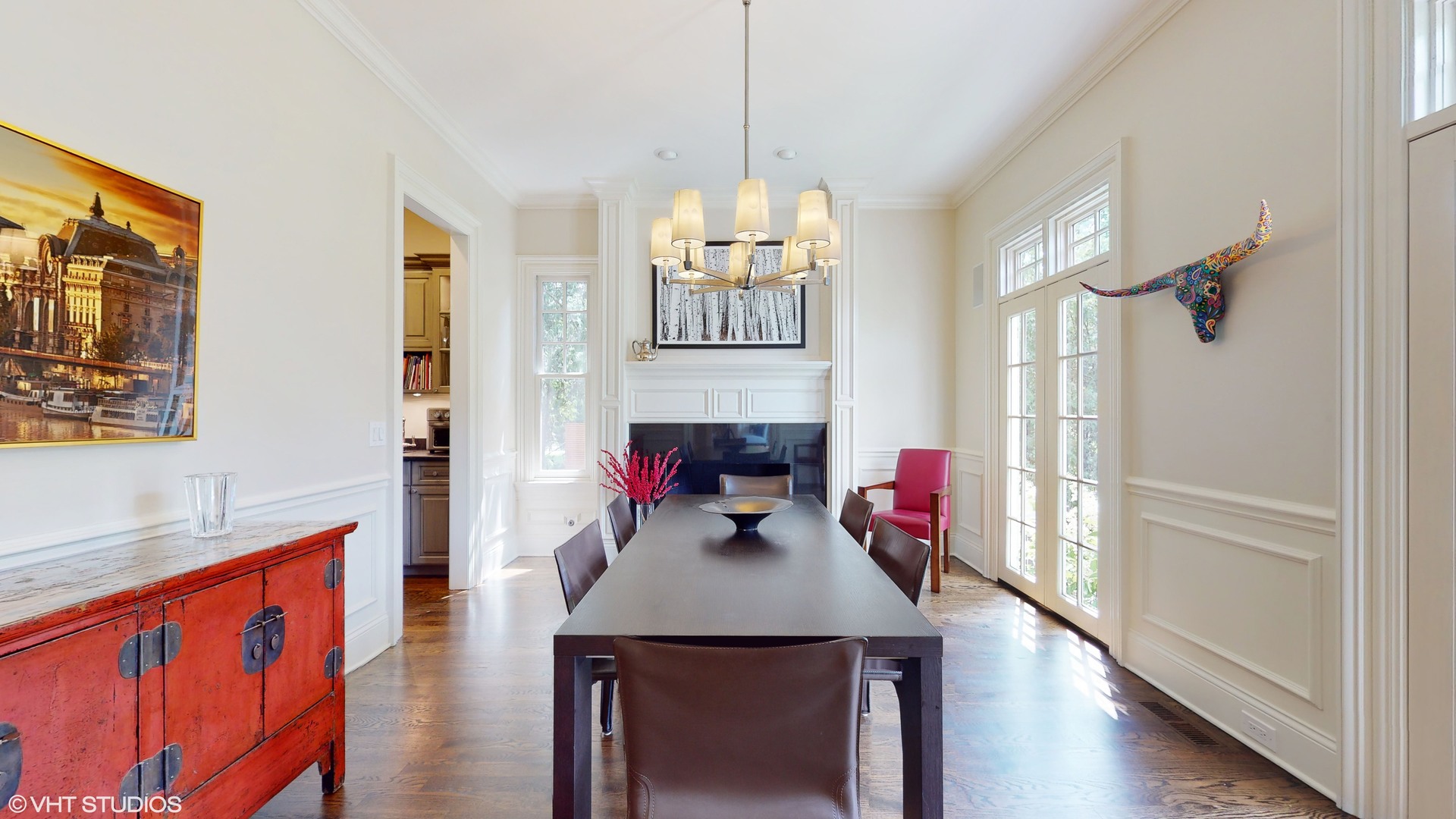 254 Franklin Road Glencoe, IL 60022 - Photo 10 of 47 a view of a dining room and livingroom with furniture wooden floor a chandelier
