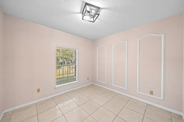 a view of an empty room with window