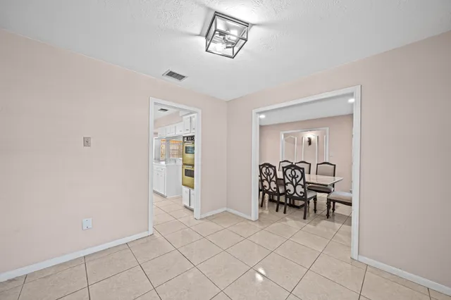 a view of room with furniture and lounge chair
