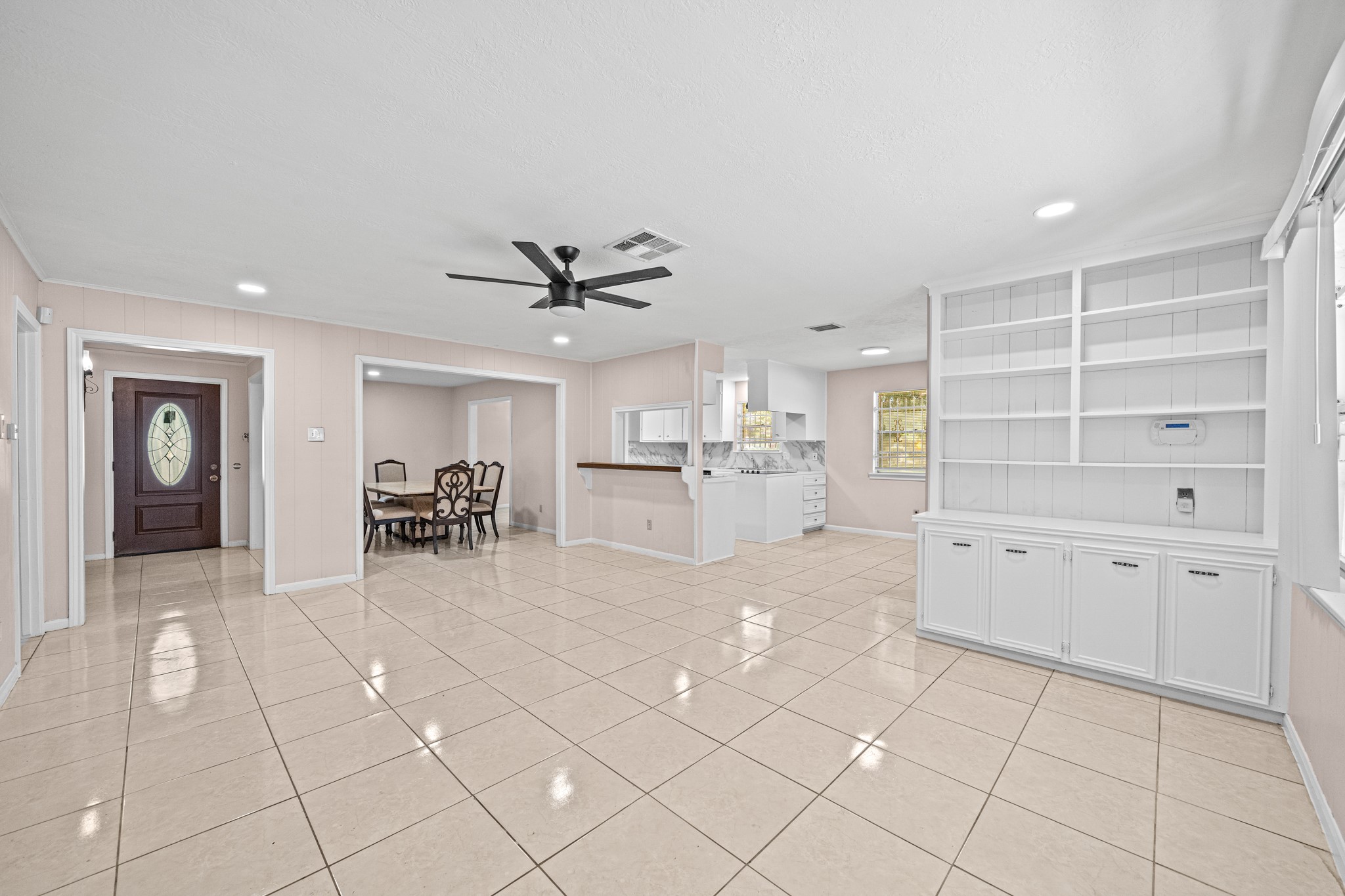 11503 High Star Drive Houston, TX 77072 - Photo 15 of 38 a view of a livingroom with furniture & a ceiling fan
