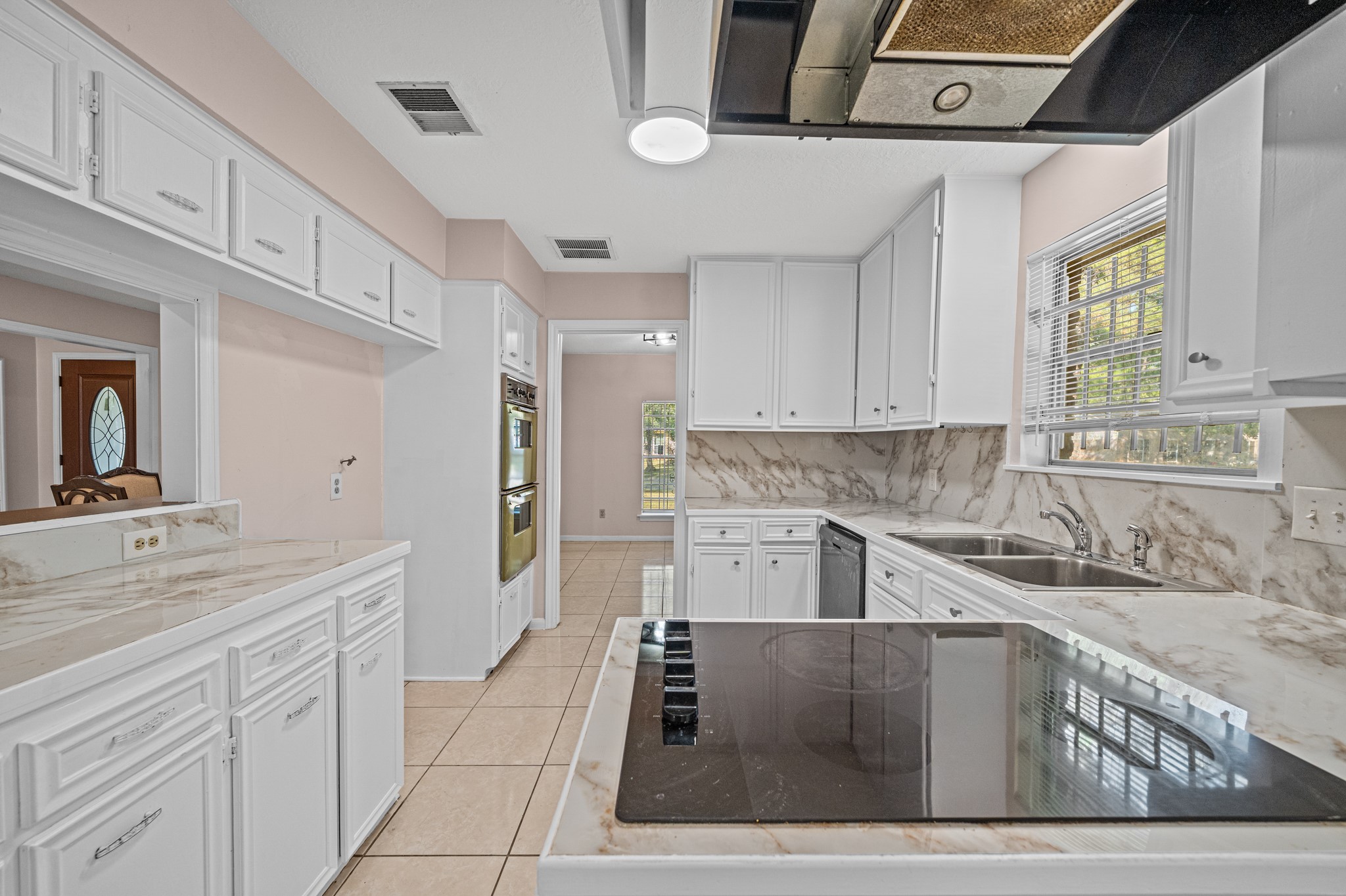 11503 High Star Drive Houston, TX 77072 - Photo 19 of 38 a kitchen with stainless steel appliances granite countertop a sink and cabinets