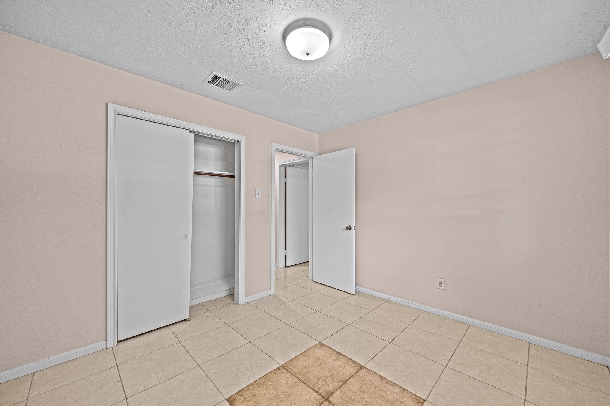 11503 High Star Drive Houston, TX 77072 - Photo 23 of 38 a view of an empty room and window