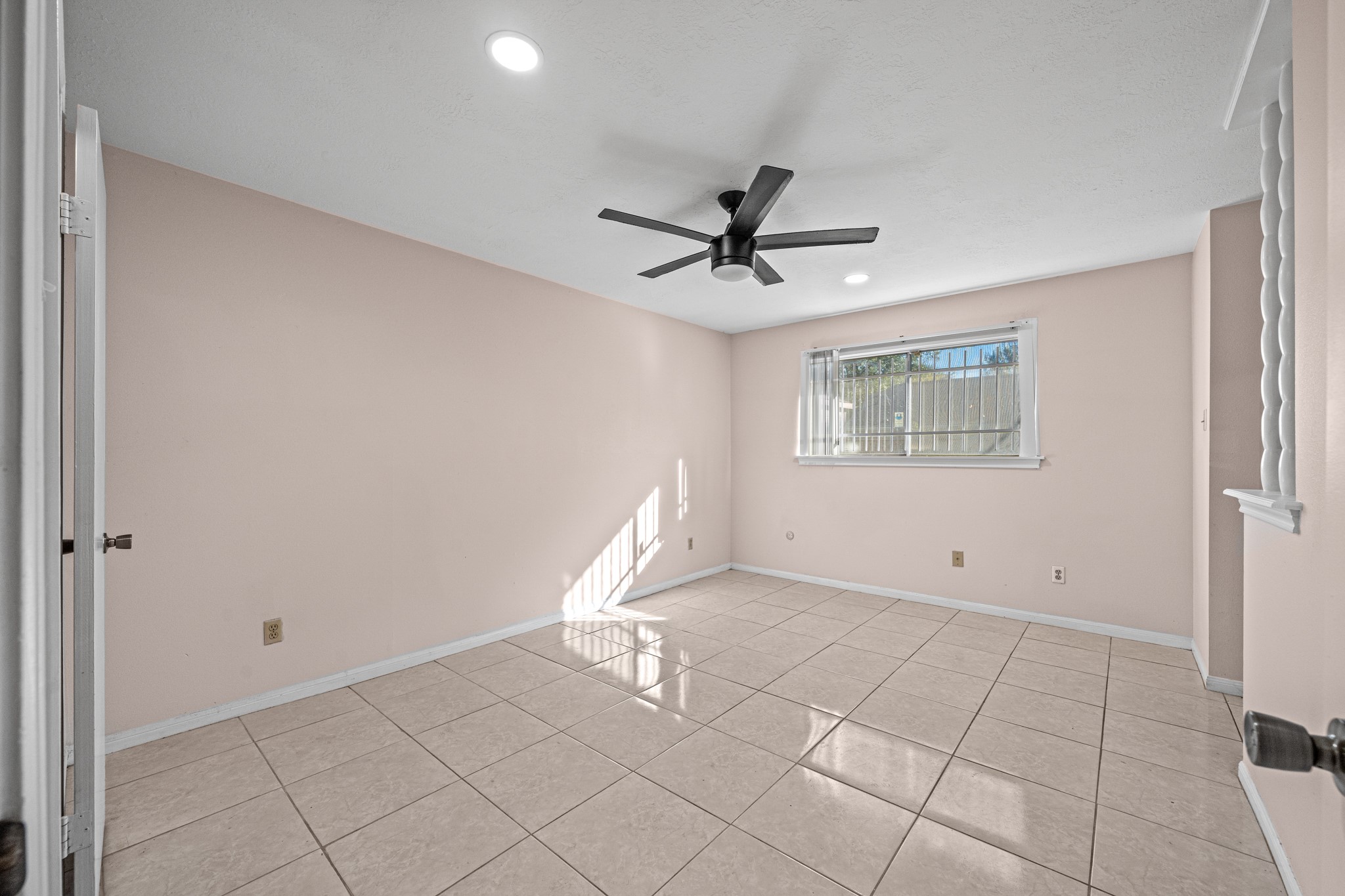 11503 High Star Drive Houston, TX 77072 - Photo 30 of 38 a view of an empty room with a window