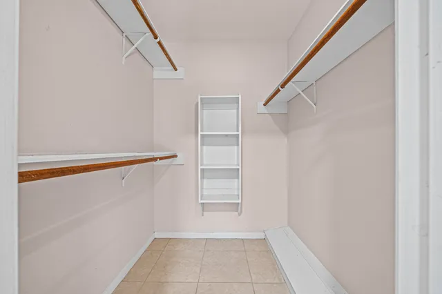 a view of an empty walk in closet