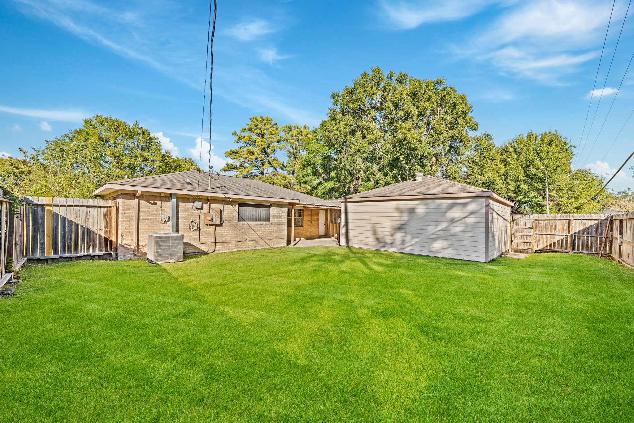 11503 High Star Drive Houston, TX 77072 - Photo 35 of 38 a view of a house with backyard and garden
