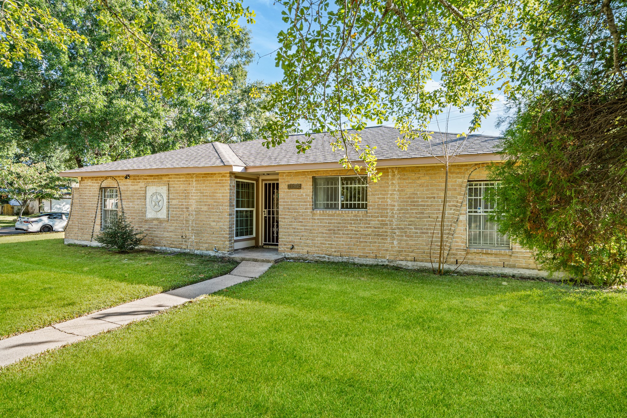 11503 High Star Drive Houston, TX 77072 - Photo 4 of 38 a view of a house with a backyard
