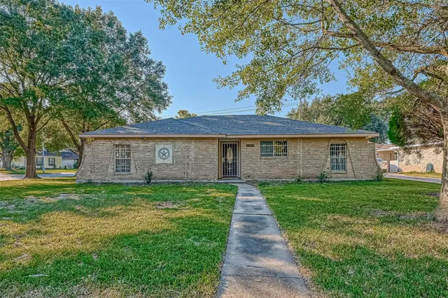 a front view of a house with yard