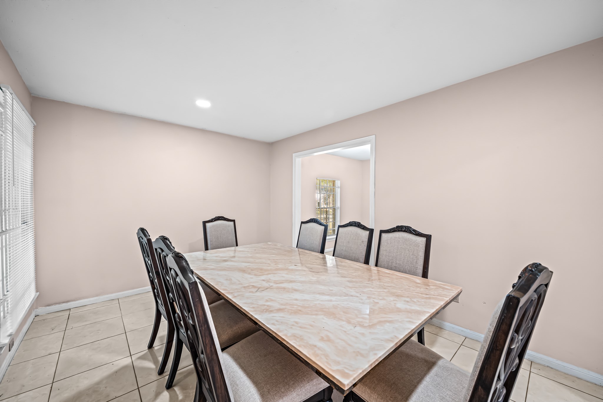11503 High Star Drive Houston, TX 77072 - Photo 9 of 38 a view of a dining room with furniture