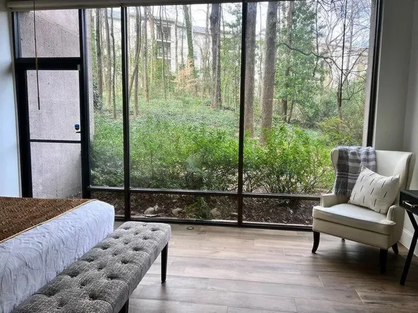 a view of a water fountain in the back yard