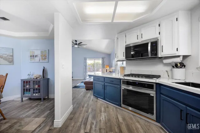 a bedroom with a large bed and flat tv