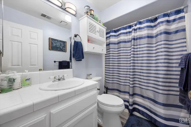 a view of backyard with outdoor seating