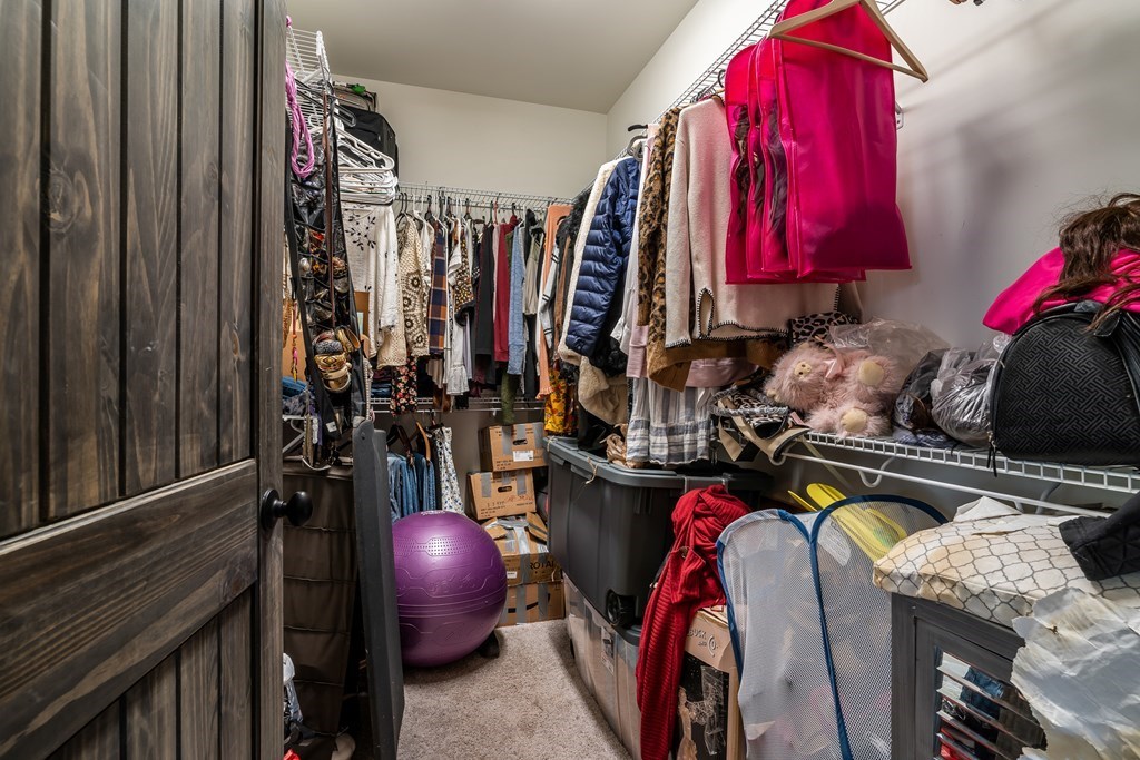 230 High River Road Ellijay, GA 30540 - Photo 11 of 27 a view of walk in closet with clothes and shoes