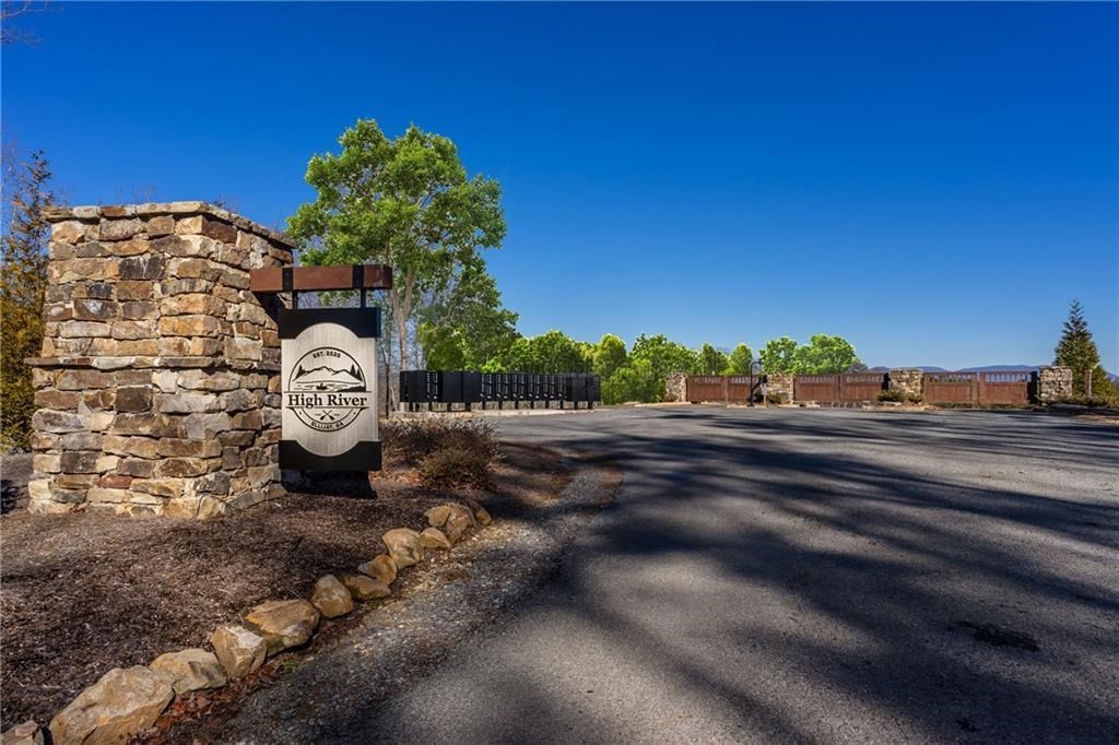 230 High River Road Ellijay, GA 30540 - Photo 27 of 27 a view of a backyard of a house