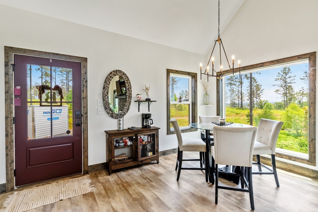 230 High River Road Ellijay, GA 30540 - Photo 4 of 27 a view of a dining room with furniture window and outside view
