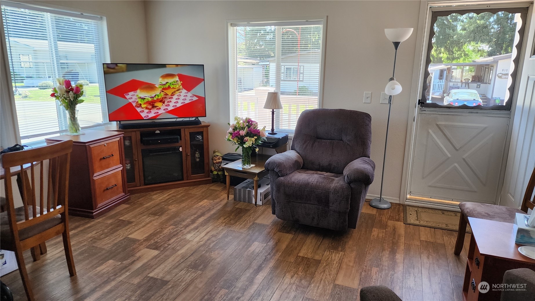 807 Mountain Villa Drive Enumclaw, WA 98022 - Photo 13 of 15 a living room with furniture flat screen tv and a large window