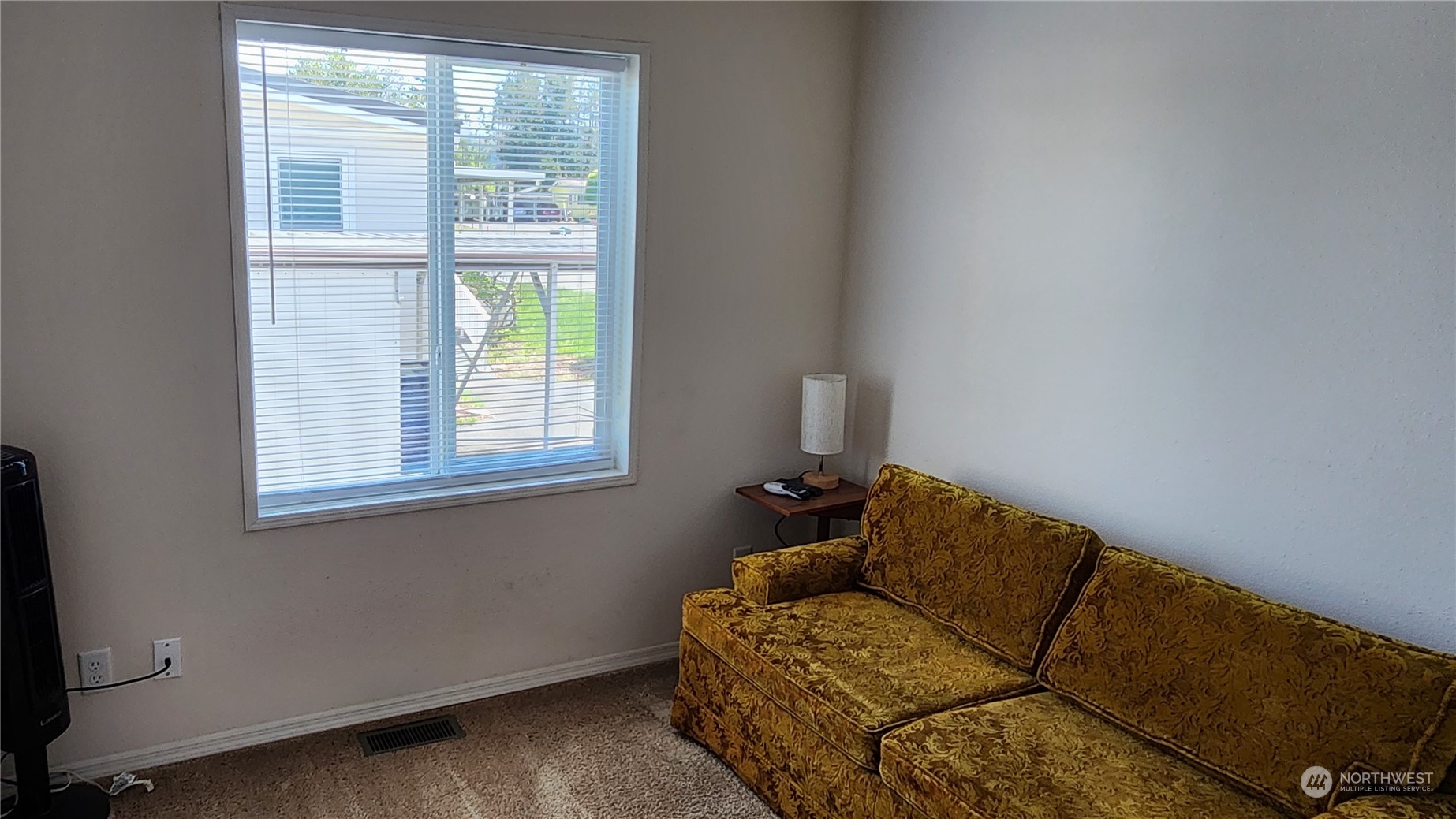 807 Mountain Villa Drive Enumclaw, WA 98022 - Photo 9 of 15 a living room with furniture and a window