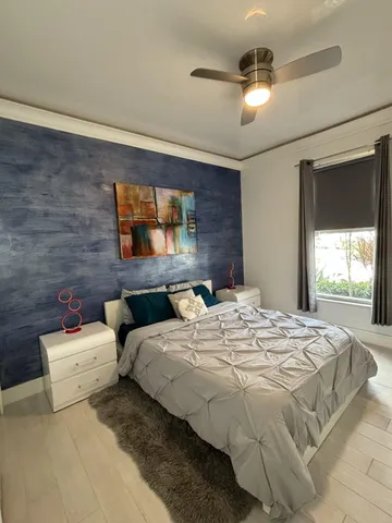 a utility room with sink dryer and washer