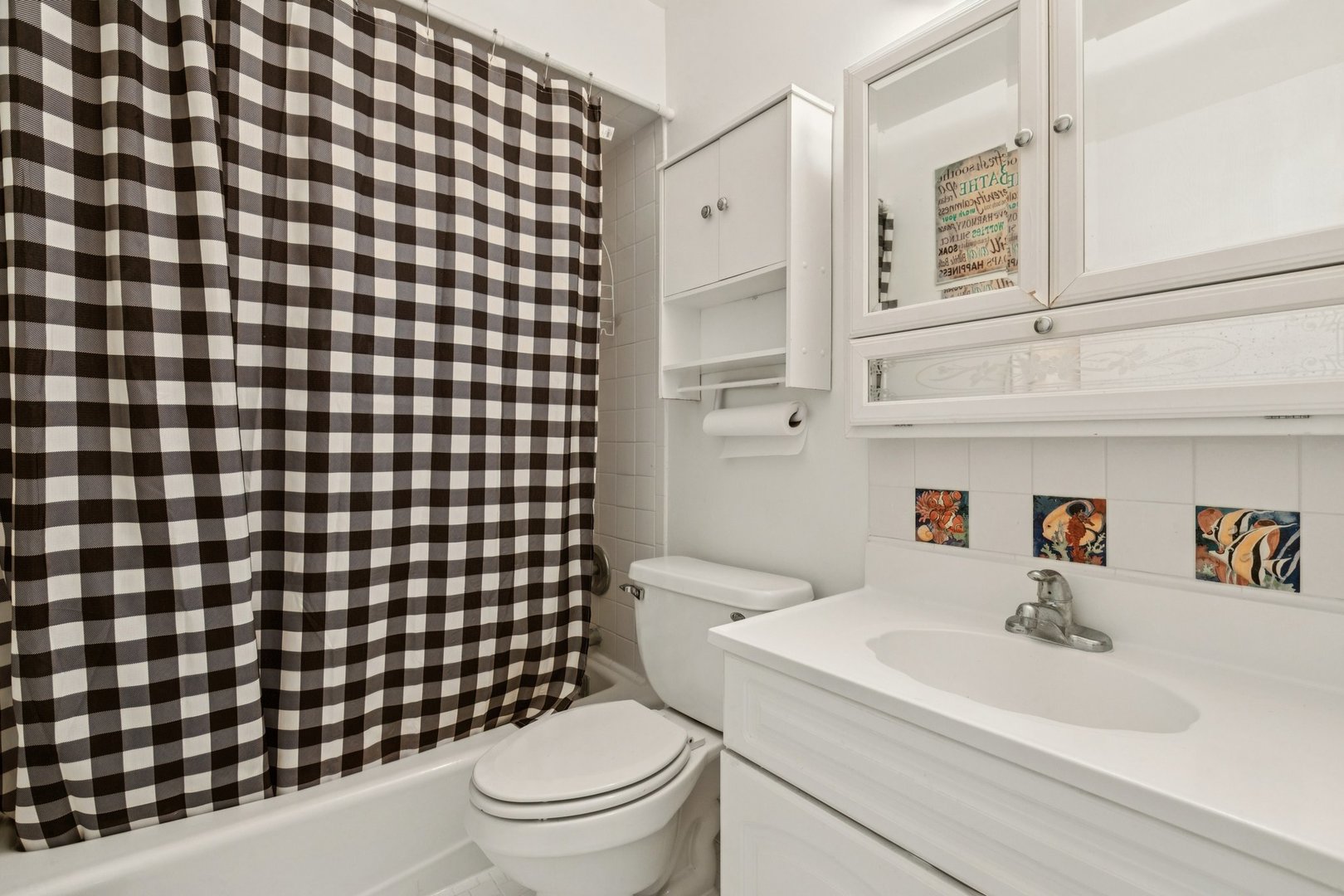 702 Cobblestone Circle, Unit D Glenview, IL 60025 - Photo 15 of 25 a bathroom with a sink toilet and shower