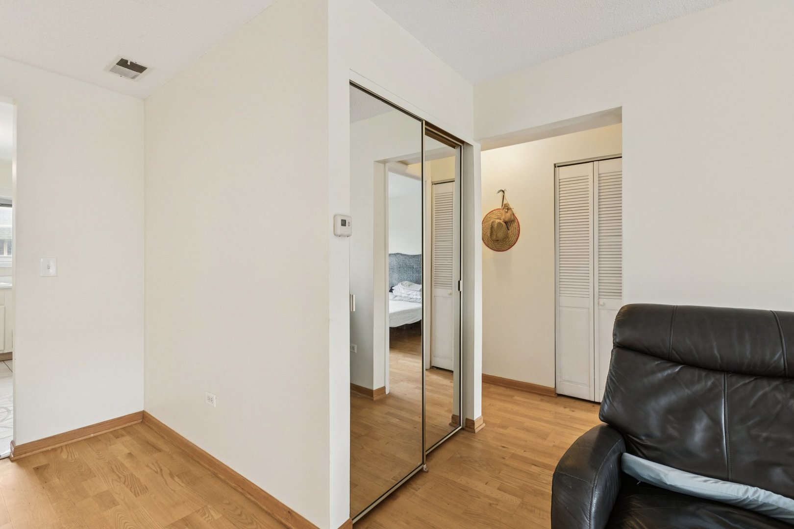 702 Cobblestone Circle, Unit D Glenview, IL 60025 - Photo 19 of 25 a view of livingroom with furniture and wooden floor