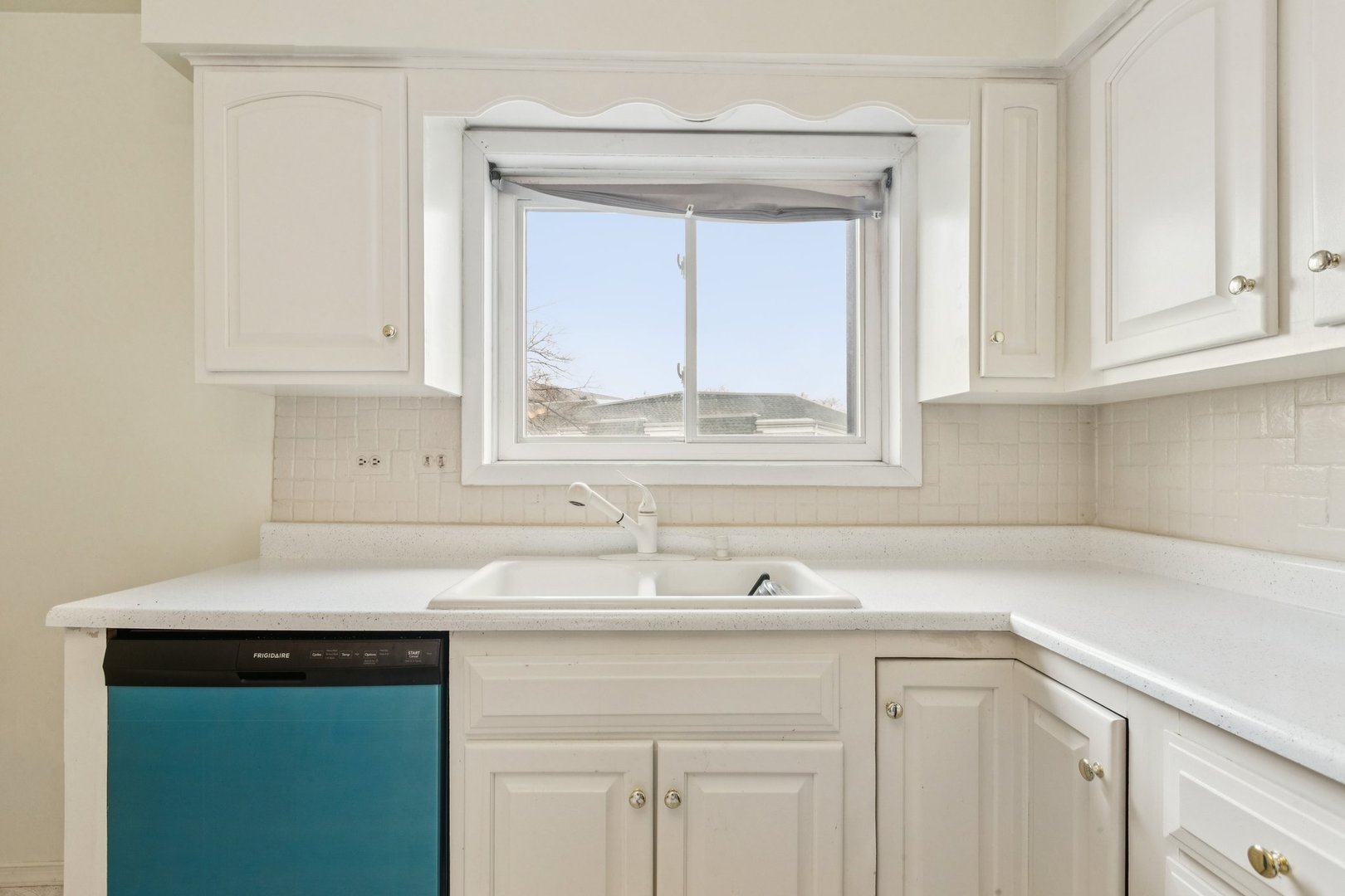 702 Cobblestone Circle, Unit D Glenview, IL 60025 - Photo 9 of 25 a view with white cabinets and a sink