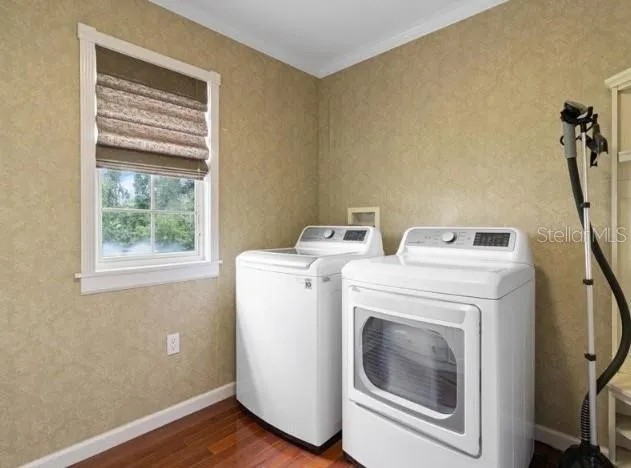 a utility room with dryer and washer