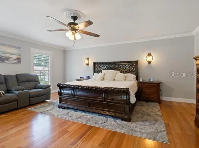 a bedroom with a bed furniture and a window