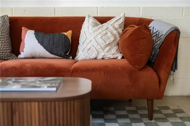 a living room with furniture and a couch