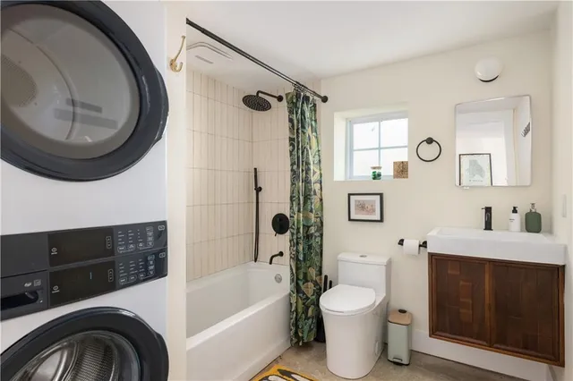 a bedroom with furniture and window