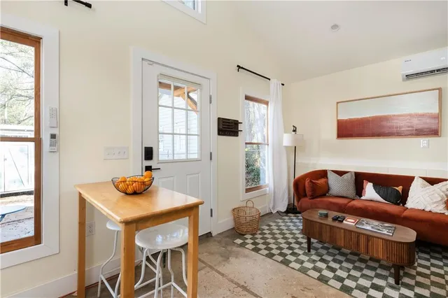 a view of a workspace with furniture