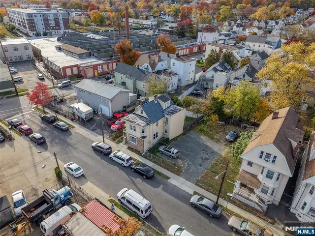 an aerial view of a city with lots of residential buildings