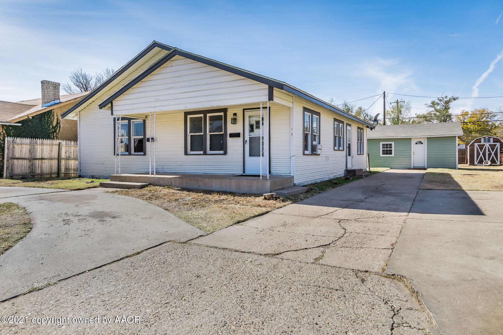 1104 South Western Street Amarillo, TX 79106 - Photo 1 of 29 a front view of a house with a yard