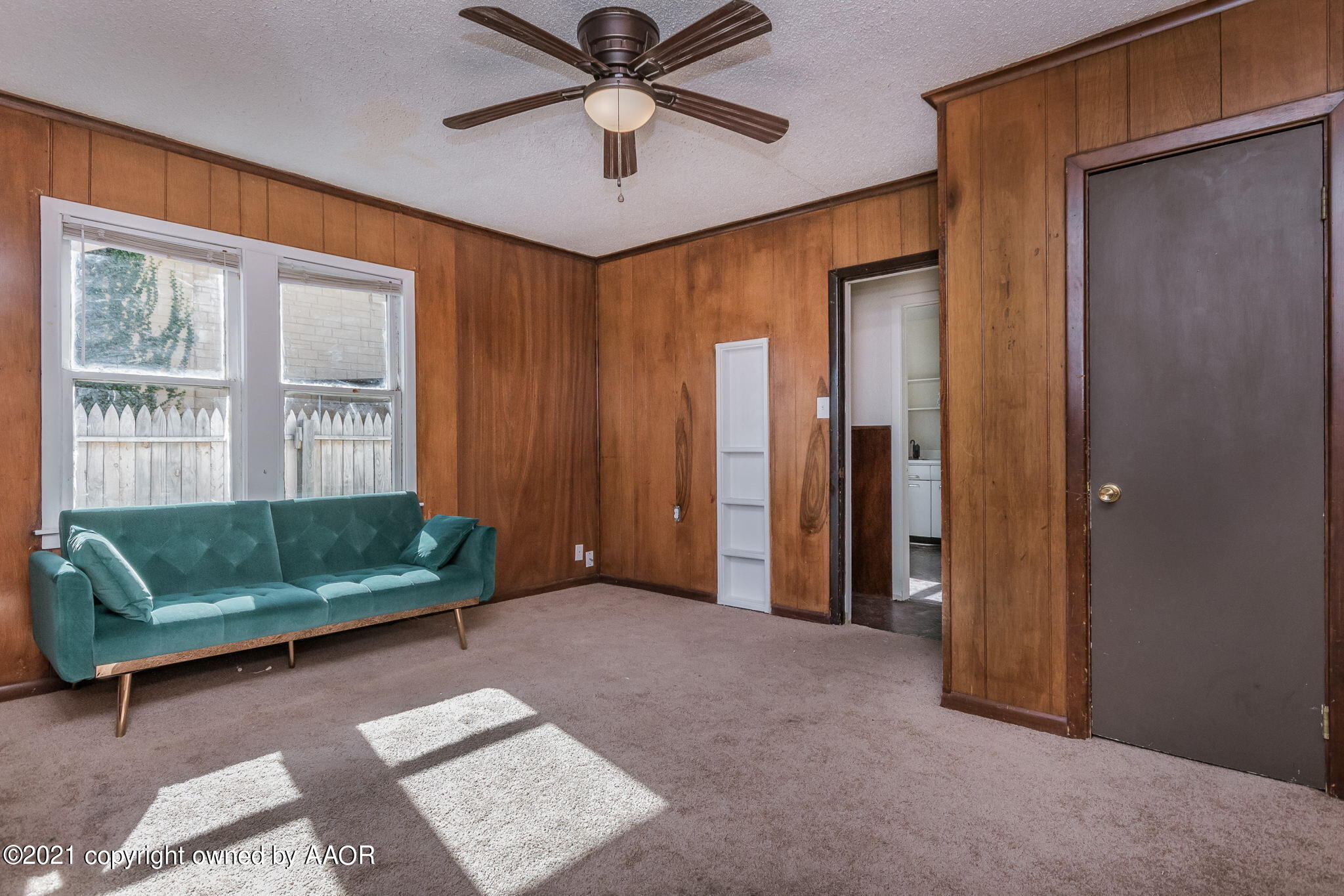 1104 South Western Street Amarillo, TX 79106 - Photo 17 of 29 a living room with furniture and a window
