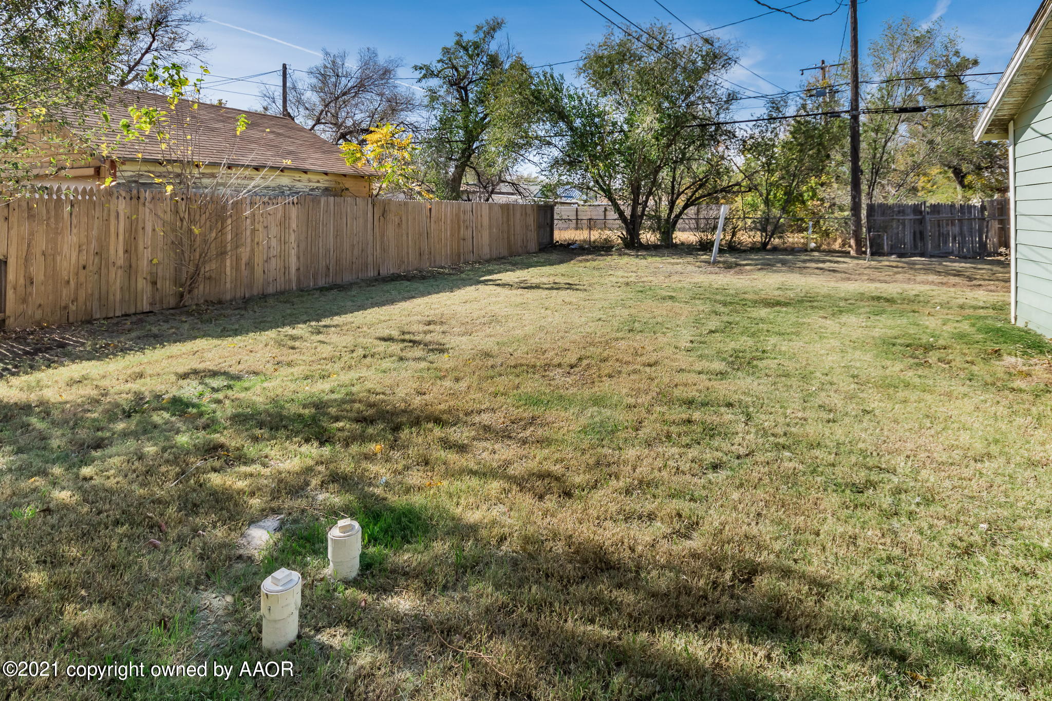 1104 South Western Street Amarillo, TX 79106 - Photo 28 of 29 a view of a yard with wooden fence