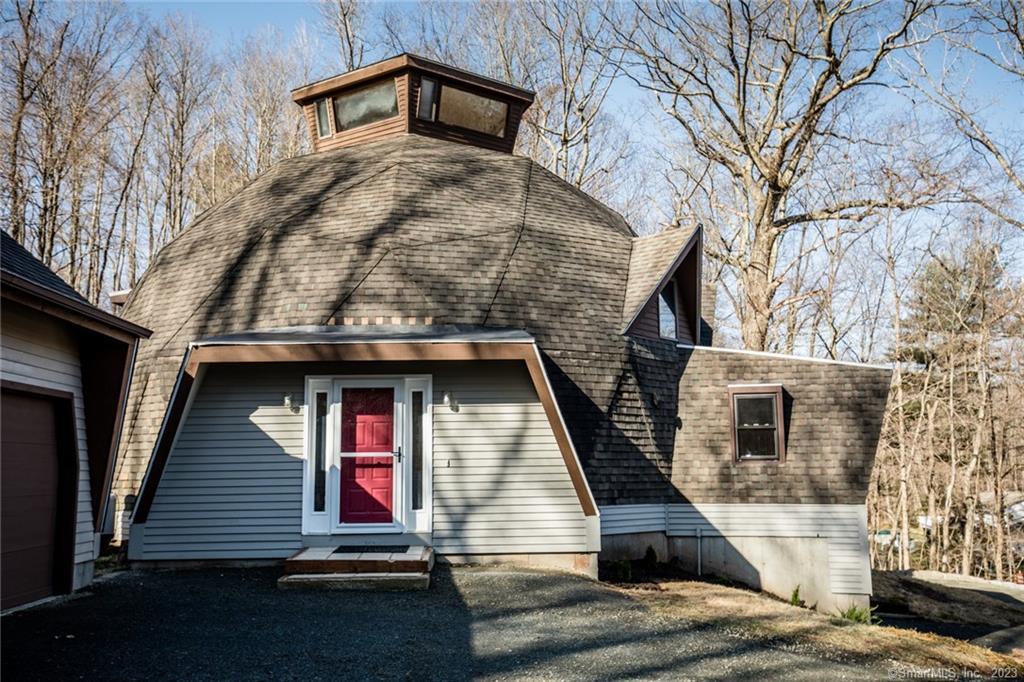 49 Coe Road Durham, CT 06422 - Photo 1 of 1 a front view of a house with garage