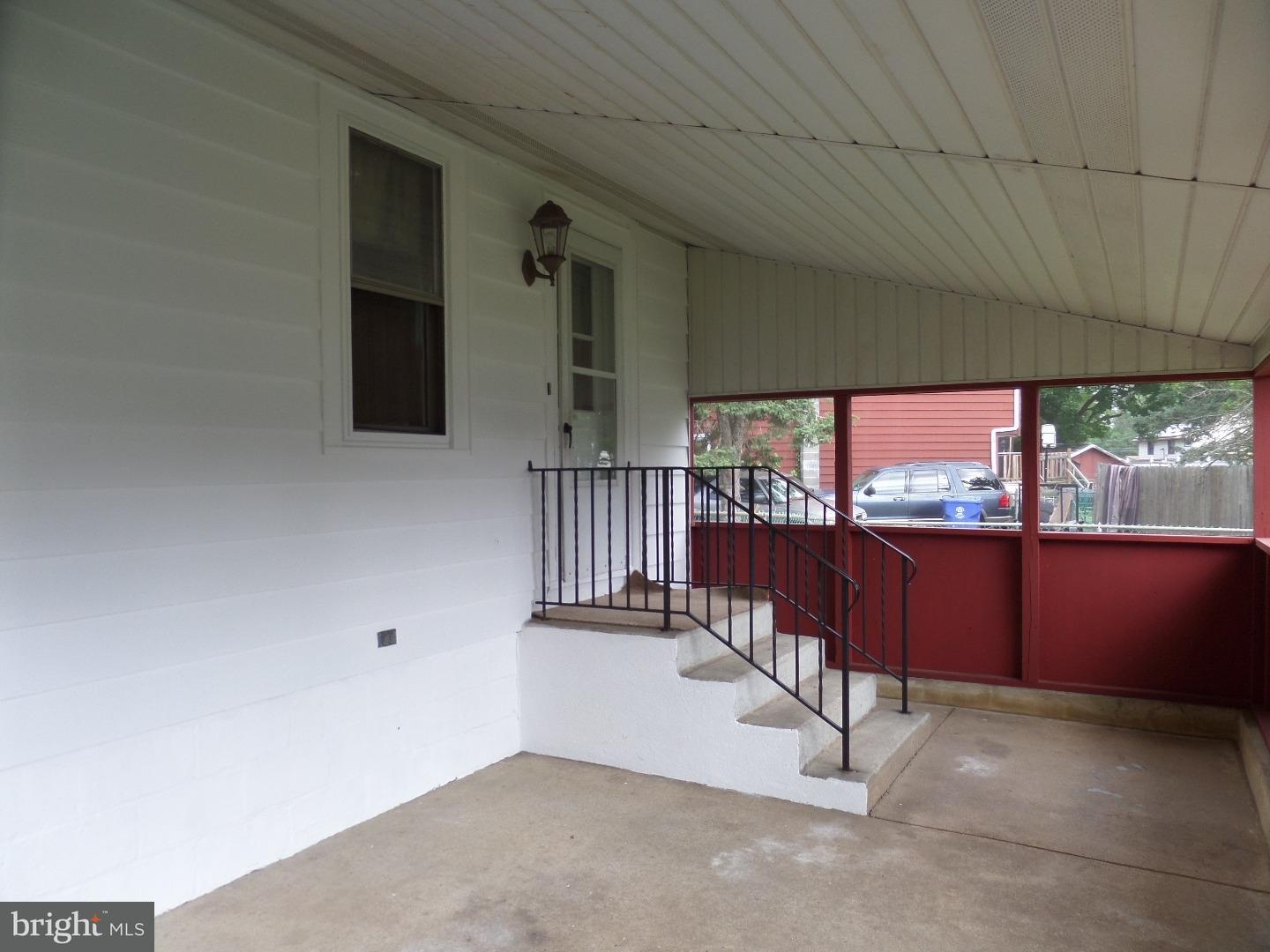 906 Woodlane Road Beverly, NJ 08010 - Photo 2 of 11 Enclosed Porch