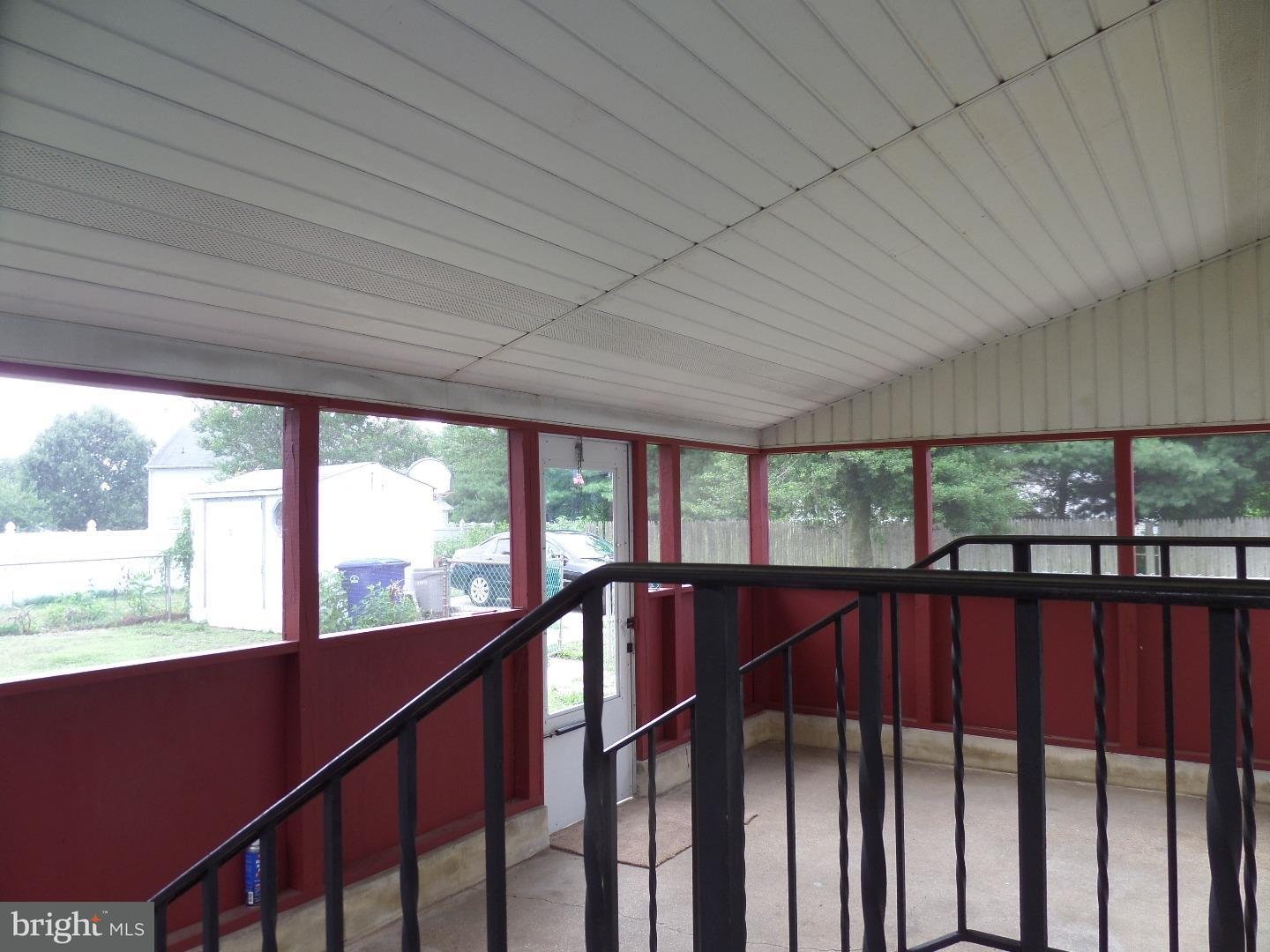 906 Woodlane Road Beverly, NJ 08010 - Photo 3 of 11 Enclosed Porch