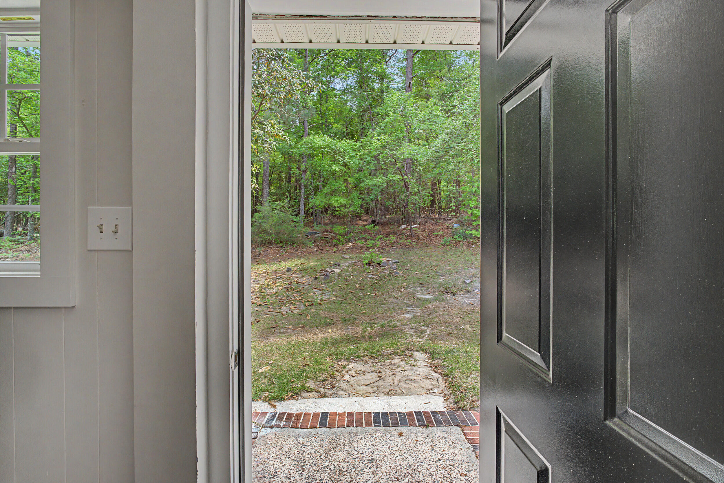3016 Wagener Road Aiken, SC 29801 - Photo 16 of 29 a view of a glass door and a window
