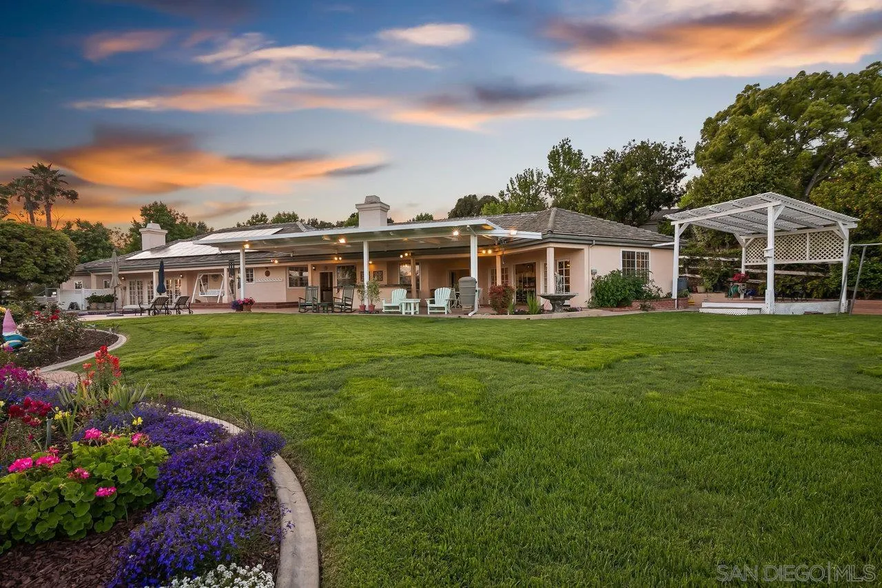 1532 Rancho Encinitas Drive Encinitas, CA 92024 - Photo 18 of 74 a front view of a house with a garden