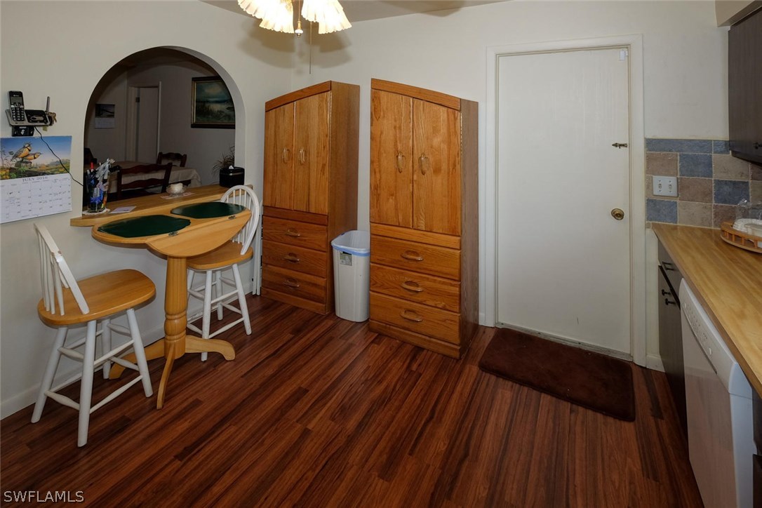 18554 Tulip Road Fort Myers, FL 33967 - Photo 10 of 25 a view of a room with wooden floor and furniture
