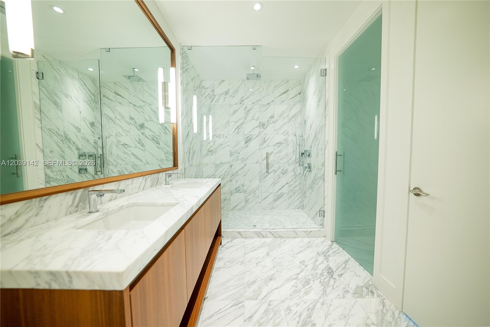 175 Southeast 25th Road, Unit 702 Miami, FL 33129 - Photo 7 of 30 a bathroom with a bathtub and shower