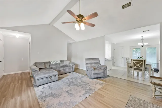 a living room with furniture and window
