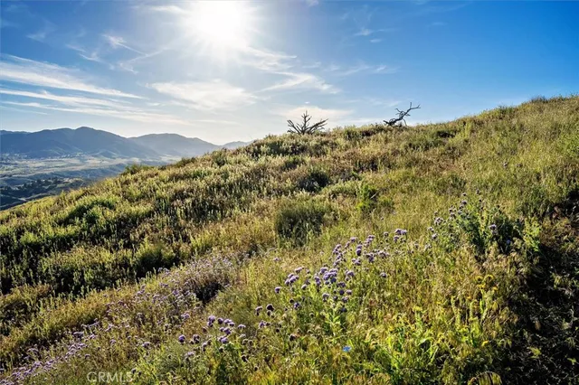a view of lake and mountain