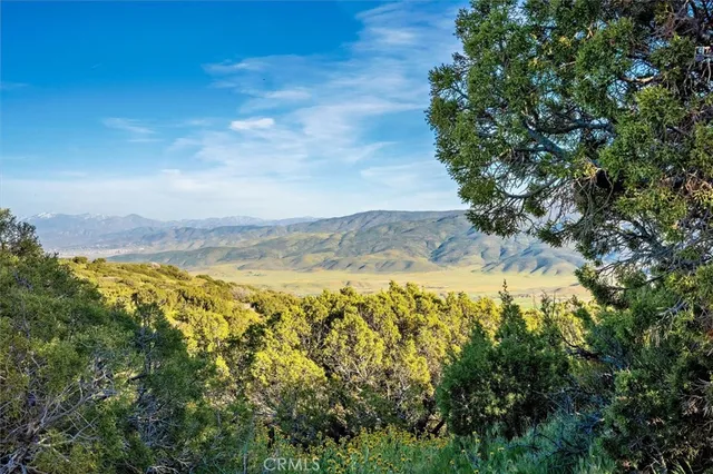 a view of a city with an ocean beach