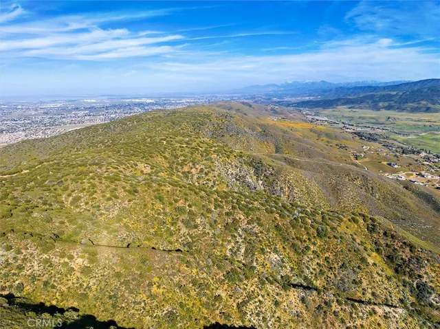 a view of a city with an ocean beach