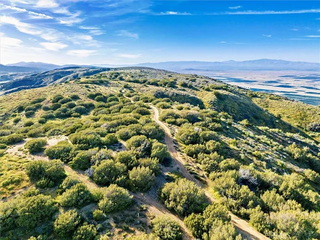 a view of a city with an ocean beach