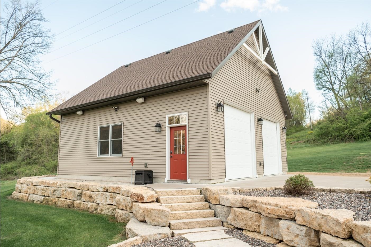 5829 South Pleasant Hill Road Elizabeth, IL 61028 - Photo 26 of 68 a front view of a house with a yard