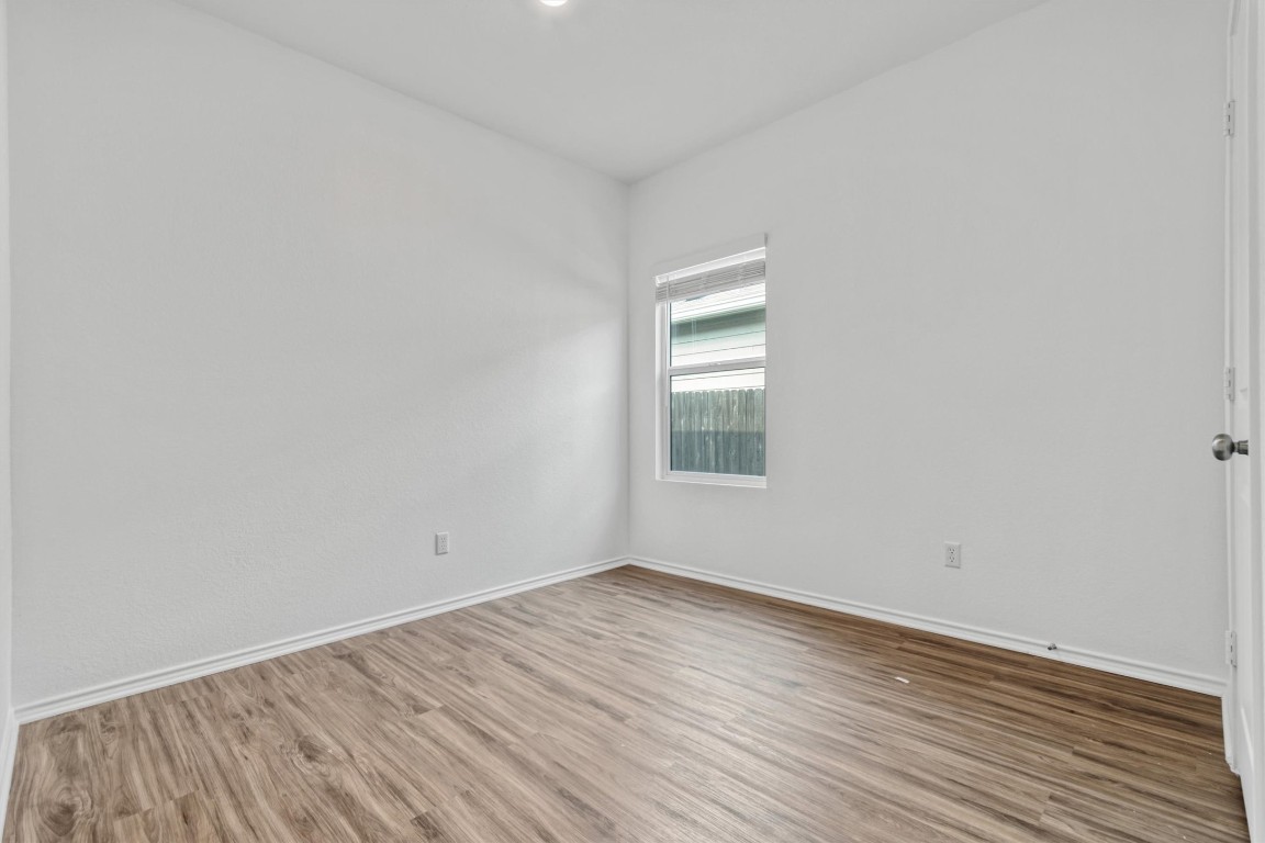 348 Soapstone Pass Maxwell, TX 78656 - Photo 13 of 18 wooden floor in an empty room