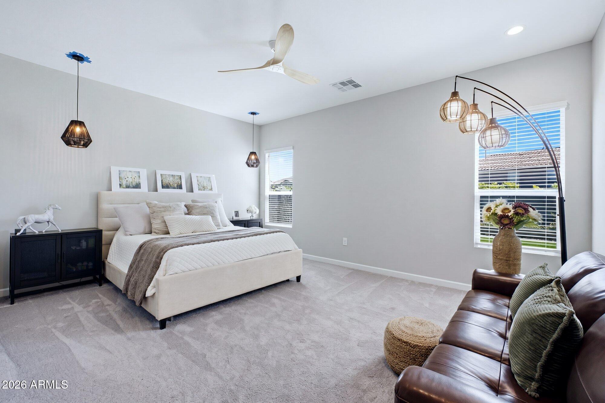 5963 East Lone Cactus Road Phoenix, AZ 85054 - Photo 17 of 22 a bed room with a bed window and a table