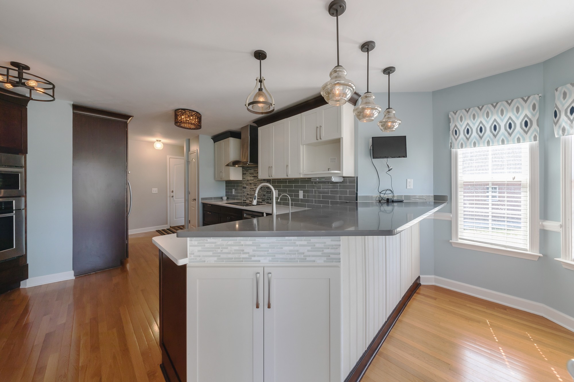 631 Harkreader Road Mount Juliet, TN 37122 - Photo 12 of 30 a kitchen with stainless steel appliances granite countertop a sink stove and refrigerator