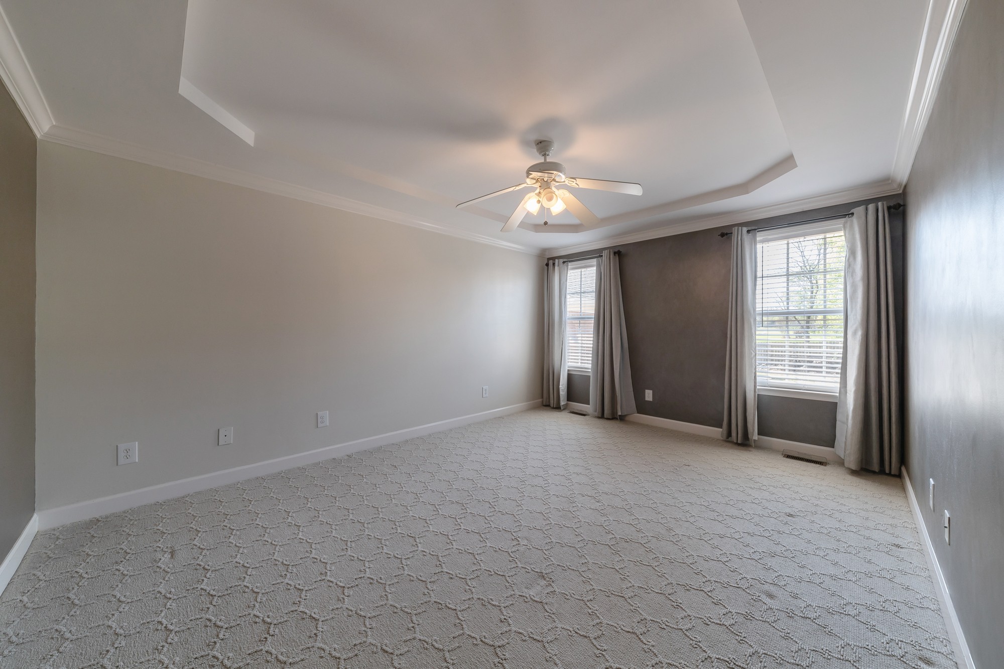 631 Harkreader Road Mount Juliet, TN 37122 - Photo 14 of 30 an empty room with chandelier fan and windows